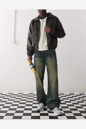 Weekday – Sphere – Weite Jeans in blauer Dirty-Waschung mit niedrigem Bund und Used-Detail