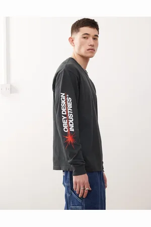 Obey – Langärmliges T-Shirt in echtem Vintage-Pigmentschwarz mit „Design Industries“-Print