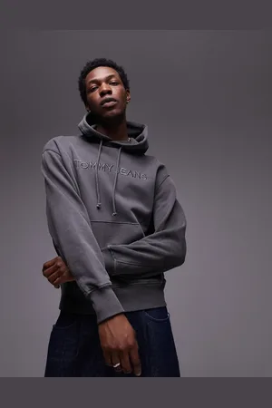 Tommy Hilfiger – Kapuzenpullover in verwaschenem mit farblich abgestimmtem Logo