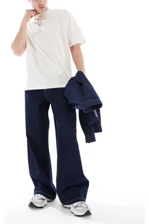 ASOS – Extrem weite Jeans in Raw-Waschung mit Detail auf der Po-Tasche