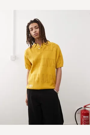A Bathing Ape – Polohemd aus Strick in Dunkelgelb mit mehreren Logos