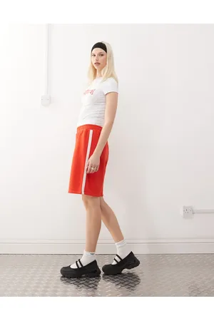 COLLUSION – Weite Longline-Shorts in
