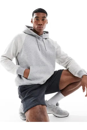 Hollister – Kastiger Kapuzenpullover in mit College-Logo und kontrastierenden Ärmeln