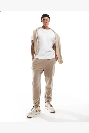 ASOS – Schmal zulaufende Jogginghose in geripptem Beige