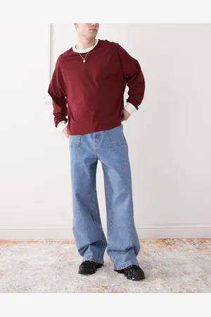 COLLUSION – Skater-Jeans in mittelblauer Waschung mit Kontrastnaht