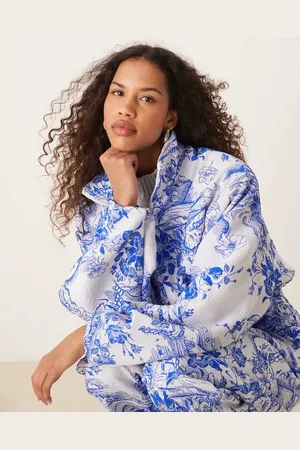 Nike – MDC – Jacquard-Jacke in Blau und Weiß mit Blumenmuster