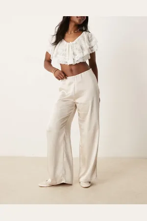 AWARE – Hose zum Reinschlüpfen aus Satin in Steingrau mit weitem Bein