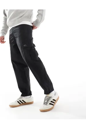 ASOS – Schmal zulaufende Oversize-Cargohose in mit Aufnäher