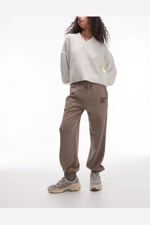 Calvin Klein – Jogginghose in Baumwoll-Terry in verwaschenem Taupe-Grau