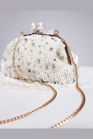 True Decadence – Weiche Clutch in mit Perlen