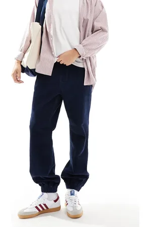 ASOS – Schmal zulaufende Cord-Jogginghose in