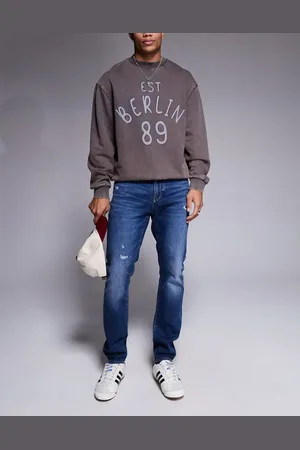 Armani Exchange – Eng geschnittene Jeans in mittelblauer Waschung