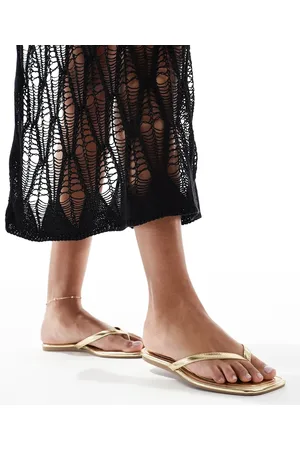SEQWL – Rooney – Zehenstegsandalen in Gold
