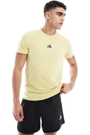 adidas – Designed for training – Workout-T-Shirt in Pudergelb