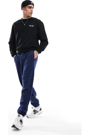 Cotton On Cotton On – Weite Trainingshose in Indigoblau mit Bündchen