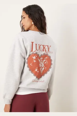 ASOS – Oversize-Sweatshirt in meliert mit „Lucky in Love“-Engelchengrafik