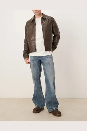 ASOS – Weite Schlagjeans in mittelblauer Waschung mit Nahtdetail