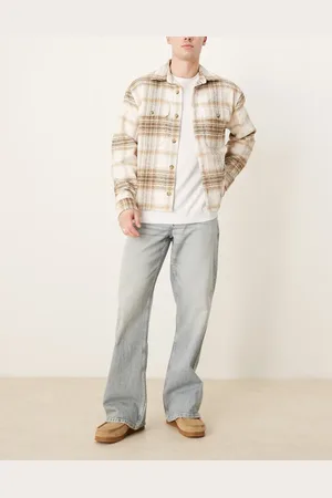 ASOS – Weite Schlagjeans in gebleichter Waschung