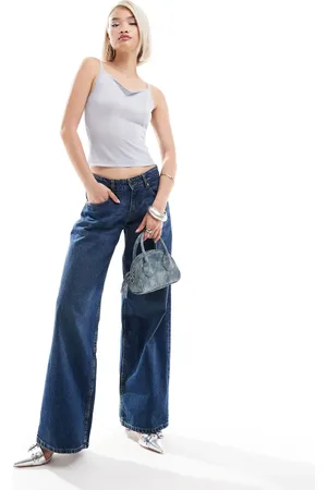 Motel – Locker geschnittene Jeans in mittlerem Indigoblau mit weitem Bein und niedrigem Bund