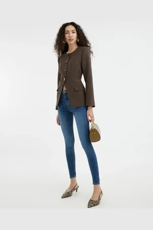 River Island – Formende Skinny-Jeans in verwaschenem Mittelblau