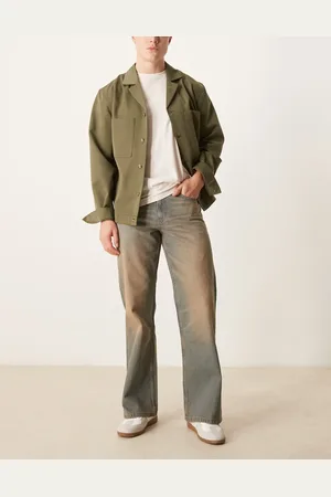 ASOS – Weite Schlagjeans in mit Farbstich