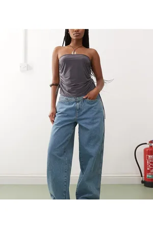 COLLUSION – Weite Jeans in mittlerer Waschung mit niedrigem Bund