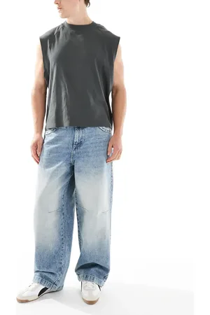 Bershka – Super Baggy Jeans in mit Stickerei hinten