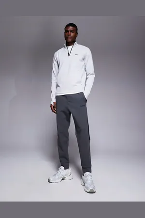 HUGO BOSS – Hadiko – Jogginghose in Dunkelgrau mit normalem Schnitt, Zierstreifen und Bündchen