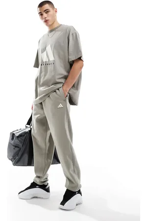 adidas Adidas Basketball – Unisex-Jogginghose aus Fleece in Beige