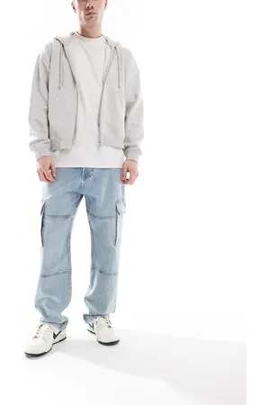 Hollister – Weite Carpenter-Jeans in hellblauer Stone-Waschung mit Taschendetail