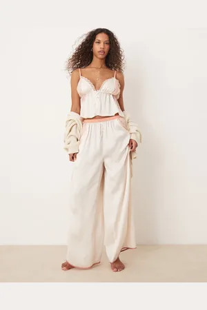 Free People – Seidiges Pyjama-Set in Elfenbeinweiß mit Spitzeneinsatz