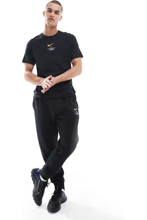 Nike – Club – Jogginghose in und Gelb mit Swoosh-Print