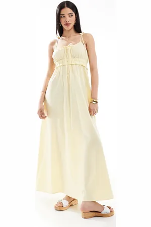 Esmée – Exclusive – Maxi-Strandkleid in Buttergelb mit gebundenen Trägern und Schleifendetail