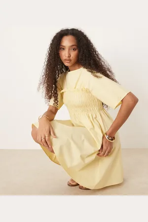ASOS – Gesmoktes, trapezförmiges Mini-Babydoll-Kleid in Buttermilchgelb