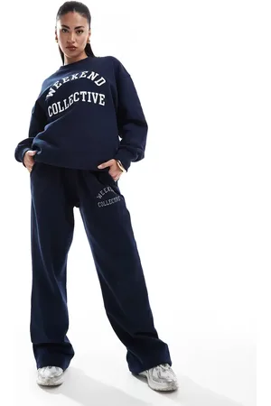 ASOS Weekend Collective – Oversize-Jogginghose in mit College-Logo