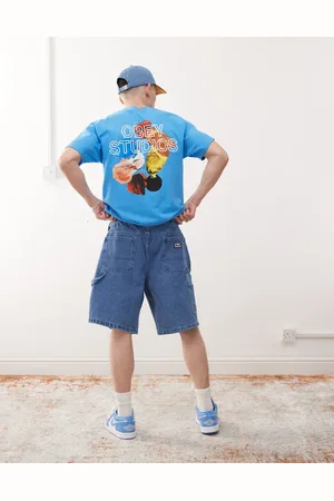 Obey – T-Shirt in dunklem Blaugrün mit „ Studios“-Logo und Rückenprint