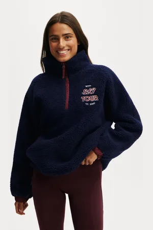 Cotton On Cotton On – Pullover in Dunkelblau mit kurzem Reißverschluss und „Ski Tour“-Grafik