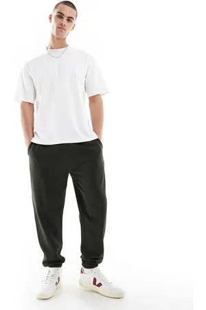 ASOS – Schmal zulaufende Basic-Jogginghose in Dunkelgrün