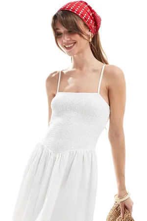 The Frolic – Exklusives, gesmoktes Mini-Trägerkleid in mit eckigem Ausschnitt und tiefer Taille