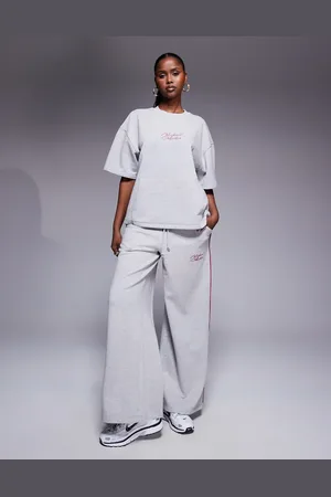 ASOS Weekend Collective – Jogginghose in meliert mit Paspelierung in Pflaume und weitem Bein