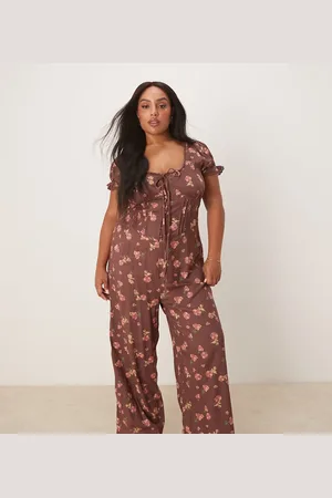 ASOS ASOS DESIGN Curve – Jumpsuit in Malve mit Blumenmuster, gesponnener Spitze und Korsetttaille
