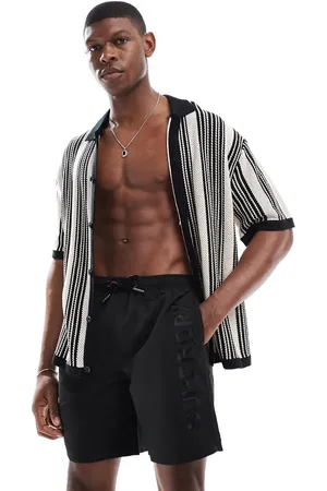 Superdry – Premium – Bestickte Badeshorts in , 17 Zoll Schrittlänge