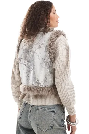Monki – Pilotenweste aus Kunstpelz in mit Used-Look und Lammfellbesatz