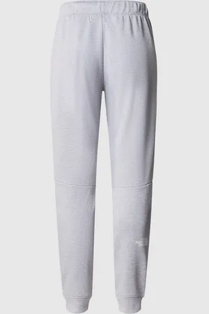 The North Face – Reaxion – Fleece-Jogginghose in und Weiß