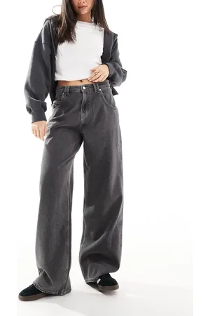 Tommy Hilfiger – Daisy – Weite Jeans in schwarzer Waschung mit niedrigem Bund