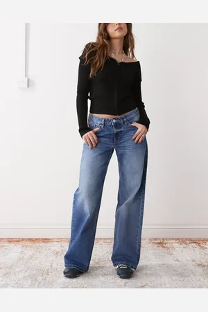 Monki – Imoo – Weit geschnittene Jeans in mittelblauer Waschung mit niedrigem Bund