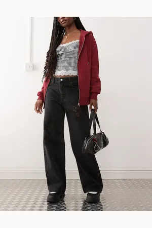 Monki – Missy – Lässige Jeans in mit niedrigem Bund und Spitze mit Lochmuster
