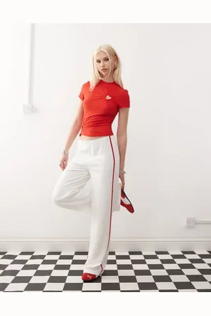 COLLUSION – Jogginghose in Creme mit Seitenstreifen