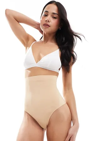 Bye Bra – Unsichtbarer, formender Tanga in Beige mit hohem Bund