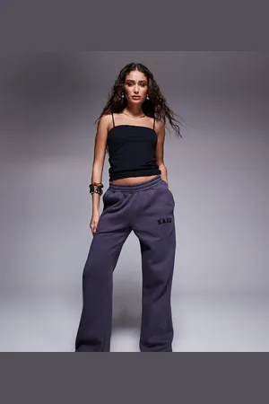 Kaiia Petite – Jogginghose in Dunkelgrau mit weitem Bein und Logo-Stickerei